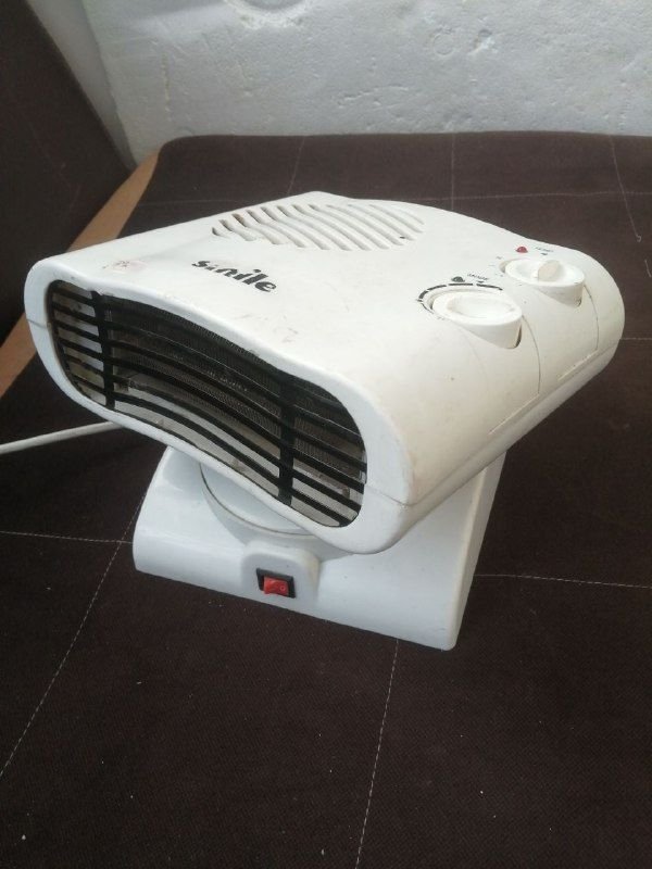 A stock electric heater with extremely low consumption and excellent heating for the bathroom chair, house, shop, etc., with the ability to rotate automatically 180 degrees, same as the fan.