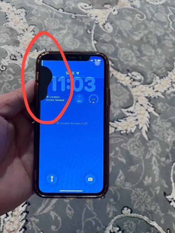 iPhone 11 Pro with carton and Iranian register