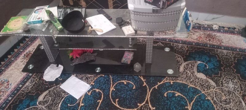 One meter TV table, healthy glass without breakage, price 500 Afghanis, contact number 0777348179