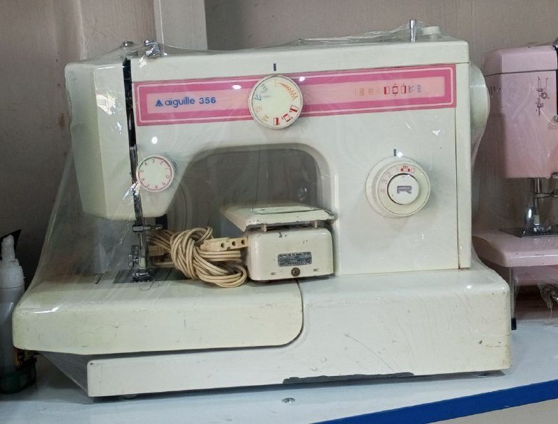Japanese electric sewing machine for auction with 13 sewing models without any warranty problems