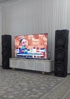 Hello, a 65 inch TV and a stylish white table