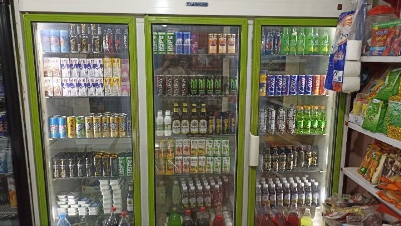 Three-door refrigerator for shops